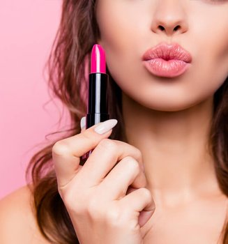 Woman air kiss with lipstick