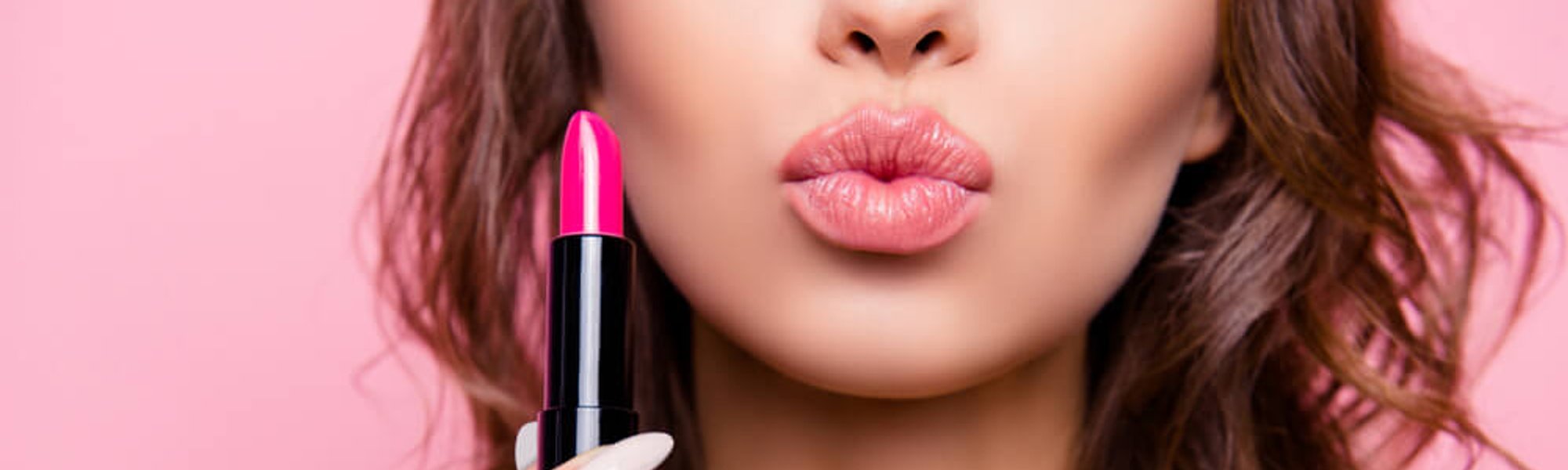 Woman air kiss with lipstick