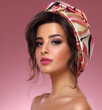 Attractive brunette woman wearing a silk scarf